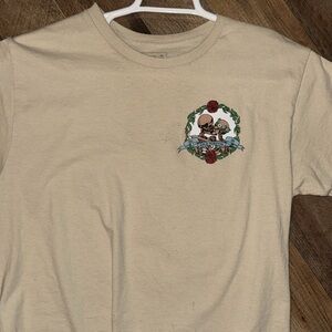 Beige Graphic T-Shirt with Floral Skull Design
